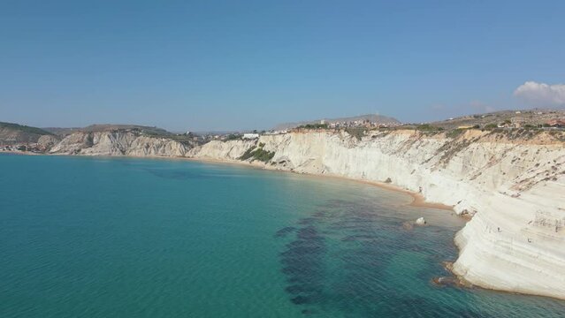 This aerial drone video shows the beautiful coastline of the Turkish Stairs, also named Scala dei Turchi. This natural wonder can be found at the coast of Sicily, southern Italy.