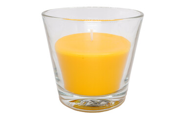 Yellow candle in the glass without background.