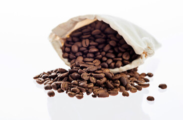 Coffee beans in bag isolated on white background