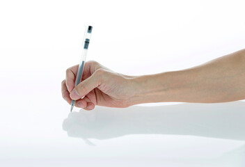 Man hand holding a pen on white background