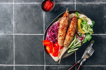 Kebab plate with vegetable and pita. Traditional middle eastern, arabic or mediterranean cuisine. Healthy foood