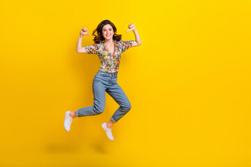Fototapeta na wymiar Full body photo of jump funky girl wear denim jeans stylish blouse pointing fingers herself best model isolated on yellow color background