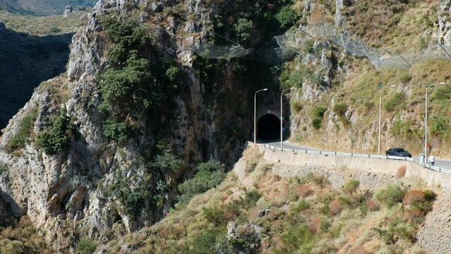 Video of the road with tunnel through the Topolia Gorge canyon. Crete. Greece