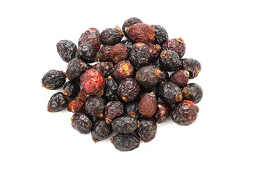 Heap of red dry rose hips isolated on a white background.