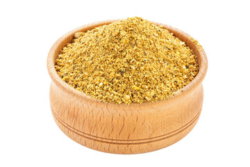 Spices in wooden bowl isolated on white background. Seasoning for cooking.