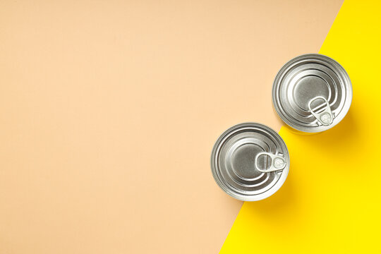 Canned food in blank metal jars, concept of canned food