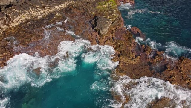 Soothing calming turquoise waves at La Gomera La Palma Tenerife aerial 
