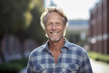 Headshot portrait photography of a joyful mature man wearing comfortable jeans against a bustling university campus background. With generative AI technology