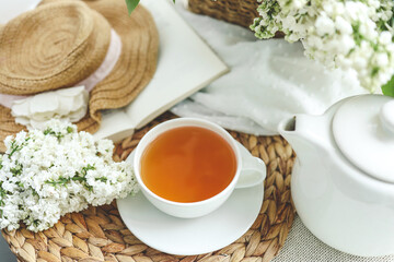 Cup of hot tea and spring home interior. good morning concept