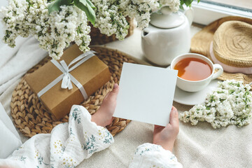 Postcard in hands with place for your text