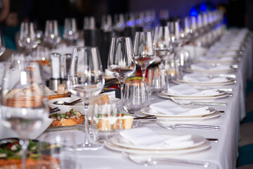 table setting at the event. clean glasses on the table