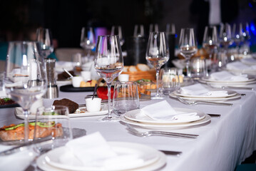 table setting at the event. clean glasses on the table