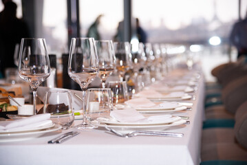 table setting at the event. clean glasses on the table