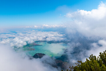 View through the cloud cover of Lake Kochel (Bavaria, Germany)