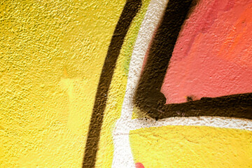 Colorful aerosol street wall background. Urban modern art texture. Wallpaper design backdrop pattern. Painted city wall close up.