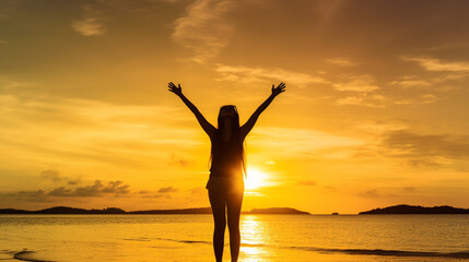 Fototapeta premium Happy woman silhouette in the sunset