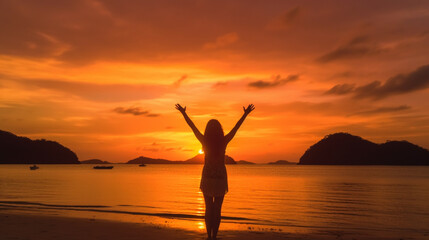 Fototapeta na wymiar Happy woman silhouette in the sunset