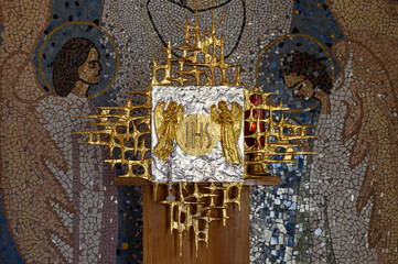 A tabernacle with the Eucharist and a sanctuary candle lamp in a chapel in Majčino selo [Mother's village] in Medjugorje, Bosnia and Herzegovina. 2022/05/08.