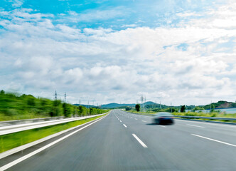 Fototapeta premium Car driving on freeway