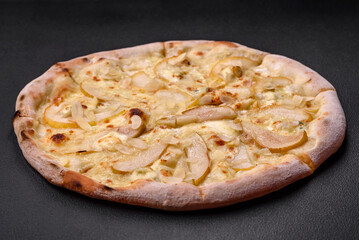 Delicious sweet pizza with pear, dorblu cheese and nuts