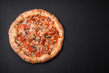 Bavarian pizza with smoked sausages, tomatoes, cheese, salt and spices