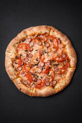 Bavarian pizza with smoked sausages, tomatoes, cheese, salt and spices