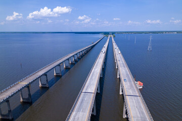 Obraz na płótnie Canvas Aerial view of the bridge over the mississippi river. highway road over the water