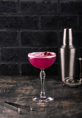 Summer pink cocktail with rose flowers