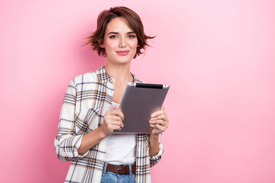 Photo of sweet shiny woman dressed plaid shirt chatting instagram twitter telegram facebook empty space isolated pink color background - Powered by Adobe