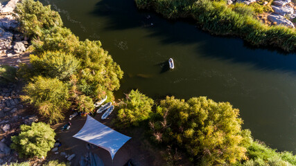 arial view of a campsite on a river