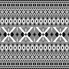 Aztec ethnic geometric triangle pattern in black and white. Seamless pattern tribal with Native American motives. Design for textile, fabric, clothing, curtain, rug, ornament, wrapping, wallpaper.