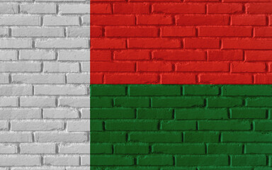 Madagascar country national flag painting on old brick textured wall with cracks and concrete concept 3d rendering image realistic background banner