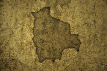 Fototapeta na wymiar map of bolivia on a old vintage crack paper background .