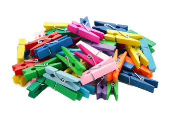 Colored wooden clothespins isolated on white background. Design elements. Macro.