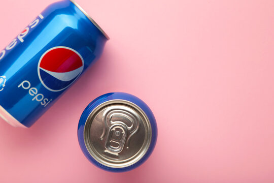 Mykolaiv, Ukraine - May 2, 2023: Pepsi drink in a can on pink background. Pepsi is carbonated soft drink produced by PepsiCo.