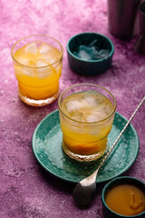 Summer cocktail with mango juice and ice