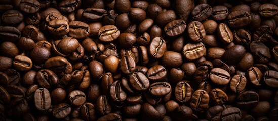 Fototapeta premium Coffee beans. Panoramic horizontal background of roasted aromatic coffee beans. Generative AI illustration.