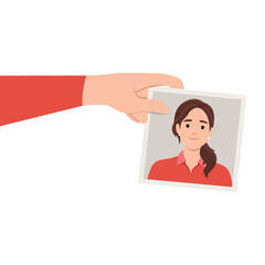 Illustration of a hand holding a photo of a woman smiling.