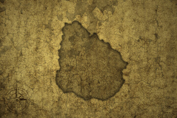 map of uruguay on a old vintage crack paper background .