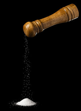 wooden salt shaker isolated on black background