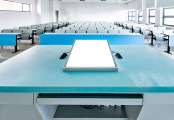 Fototapeta na wymiar Seminar podium with blank screen in an university