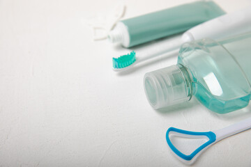 Bathroom with sonic electric toothbrush, toothpaste, mouthwash, dental floss and tongue cleaner . Oral hygiene. Dental care.Dentistry concept.Place for text.Place for copy.MOCKUP