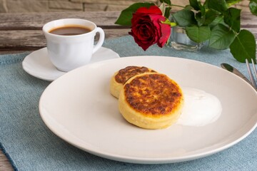 curd fritters close-up Food photo in a dark tone, cheesecake