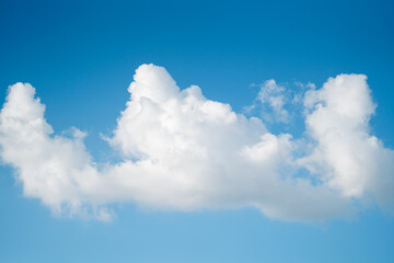 Naklejka na ściany i meble Beautiful white clouds​ and​​ blue sky