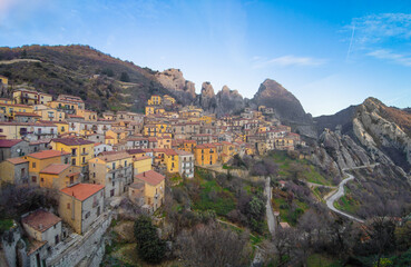 Fototapeta premium Castelmezzano (Italy) - A view of little old village, dug into the rock in the natural park of the Dolomiti Lucane, Basilicata region, famous also for the alpinistic ways.