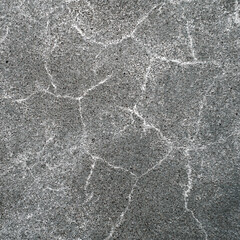 Old concrete wall with abstract cracks. Soft focus