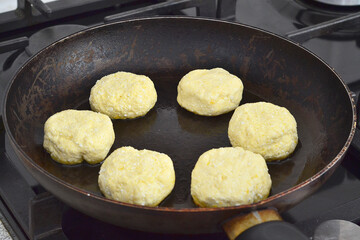 sweet cheesecakes are fried in a pan