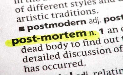 close up photo of the words post mortem