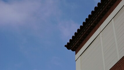 tile roof cornice against the sky