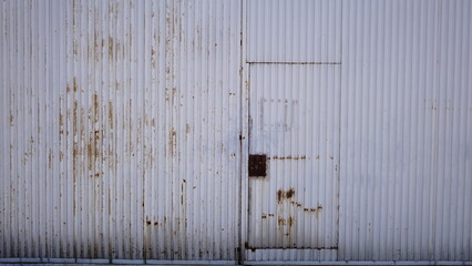 corrugated rusty industrial door as background